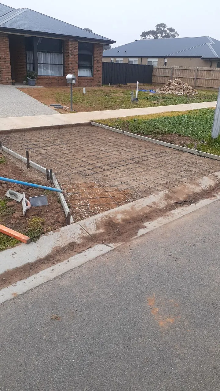 Driveway formed up and laid with steel reinforcing mesh before the pour